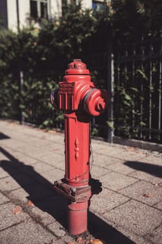 red fire hydrant in the city. fire safety