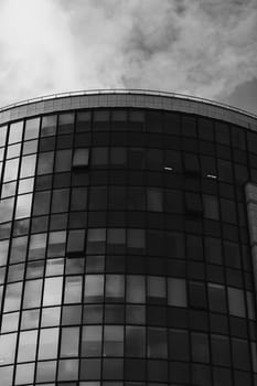 financial glass building of an office or bank against the sky