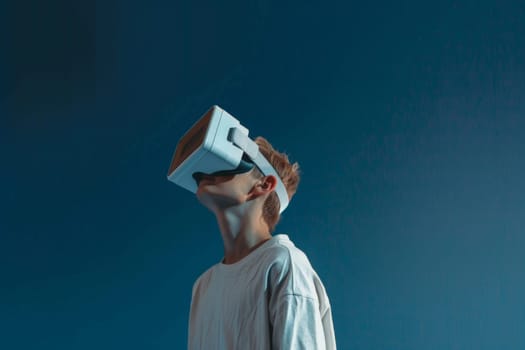 A young man wearing a white shirt and a white virtual reality headset. Concept of excitement and adventure as the man prepares to explore a new virtual world