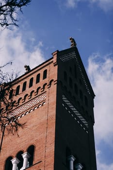 Red Catholic Church against the blue sky in Minsk