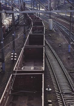 Cargo train platform with container on rail station