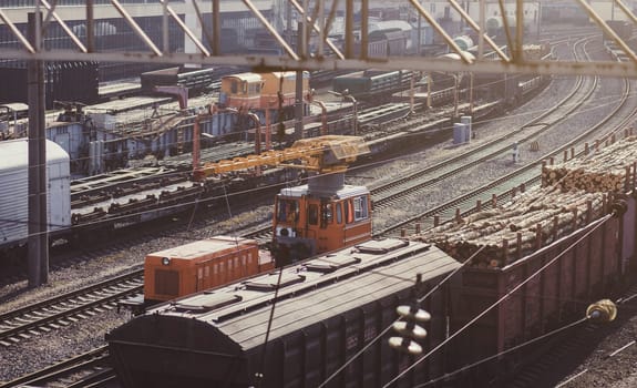 railway depot with freight trains and locomotives