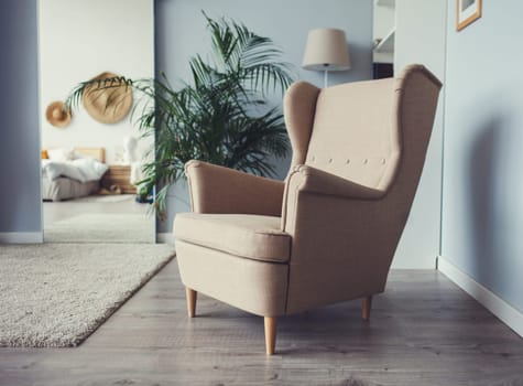 armchair on wooden floor in modern Scandinavian interior