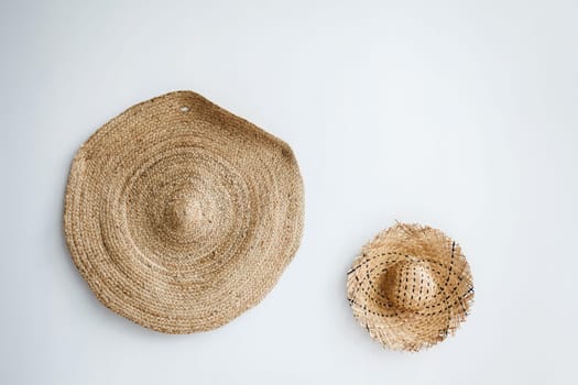 minimalism in the loft interior. two vintage straw hats on the wall