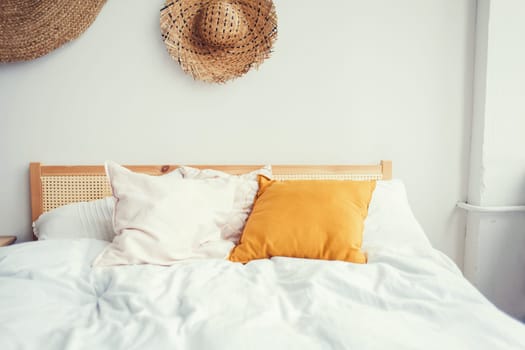 stylish bedroom interior design with colorful pillows on bed.