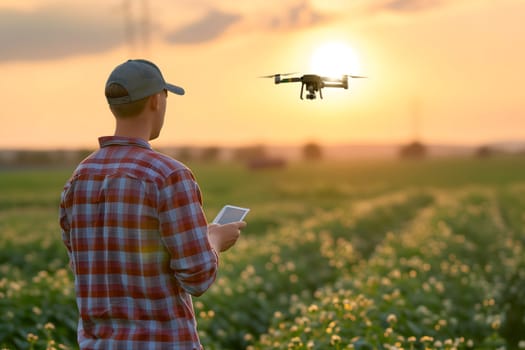 Farmer in the field using drone. Neural network generated in January 2024. Not based on any actual scene or pattern.