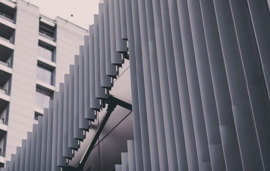 Metallic wall or roof panels. Close-up fragment of minimalist business building interior. Abstract modern