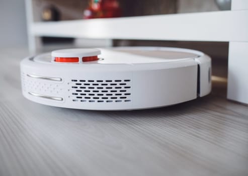 close-up robot vacuum cleaner for daily cleaning of the floor