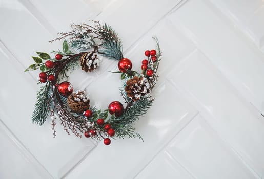 decorated wall for Christmas. spruce and cones for the new year