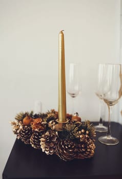 Christmas decoration with candles on wall background