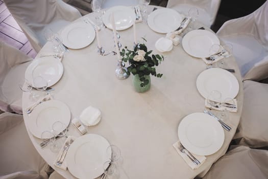 Luxury table settings for fine dining with and glassware. the view from the top