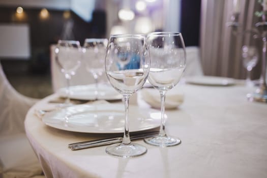 beautifully served table in the restaurant. wine glasses