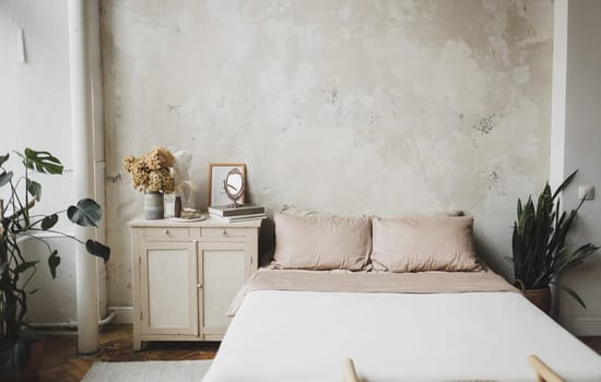 interior of a cozy bedroom in a modern minimalist design. Real photo of the hotel or room