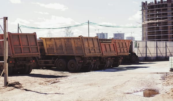 lots of big trucks on the construction site