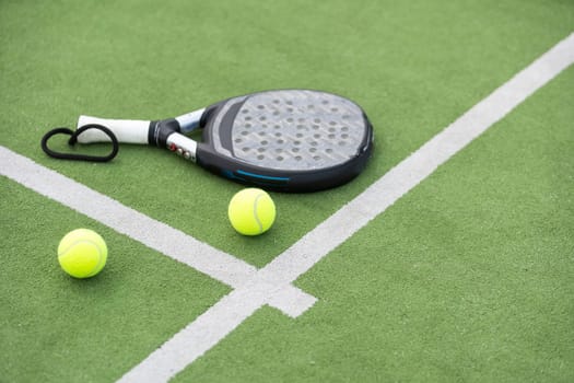Paddle tennis racket and ball. High quality photo