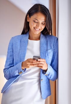 Businesswoman, cellphone and texting communication in home for online networking or entrepreneur, startup or internet. Female person, smartphone and message conversation, connectivity or contact us.