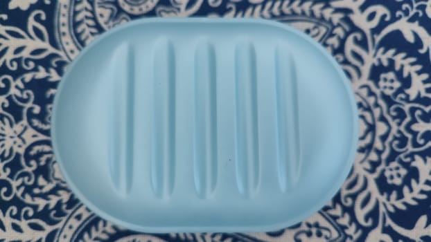 blue plastic soap dish for soap, hygiene object. High quality photo