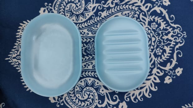 blue plastic soap dish for soap, hygiene object. High quality photo