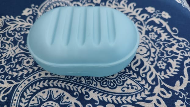blue plastic soap dish for soap, hygiene object. High quality photo