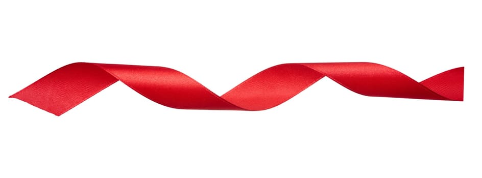 Swirling red silk ribbon on white background, gift wrapping decor