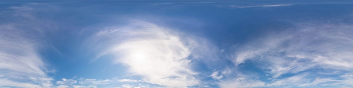 Sky panorama with Cirrus clouds in Seamless spherical equirectangular format. Full zenith for use in 3D graphics, game and editing aerial drone 360 degree panoramas for sky replacement