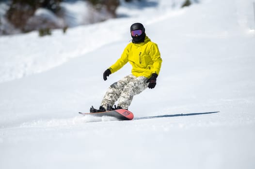 Grandvalira, Andorra: 2024 February 5 : Snowboarder on the slopes of Grandvalira in Andorra in winter 2024.