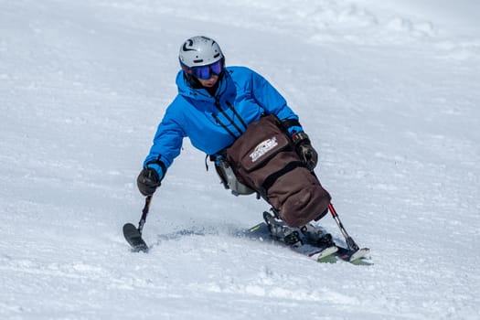 Grandvalira, Andorra: 2024 February 5 : Disabled skier skiing on the slopes of Grandvalira in Andorra in winter 2024.