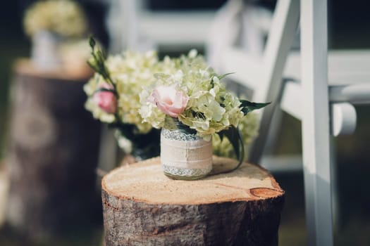 wedding decoration-fresh flowers in a vase with water