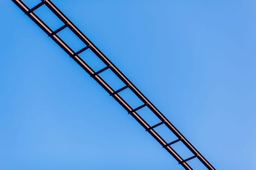 Staircase against blue sky. Development motivation career growth concept