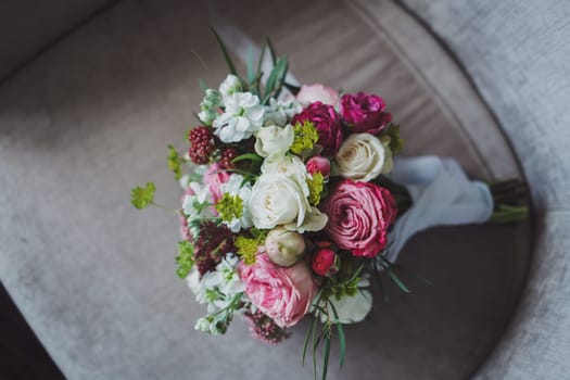 Beautiful wedding flowers bouquet on chair