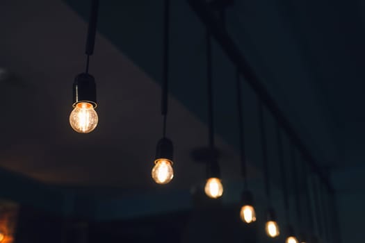 a row of old vintage light bulbs in the restaurant room