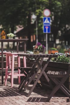 Old cozy city street cafe outdoors. 