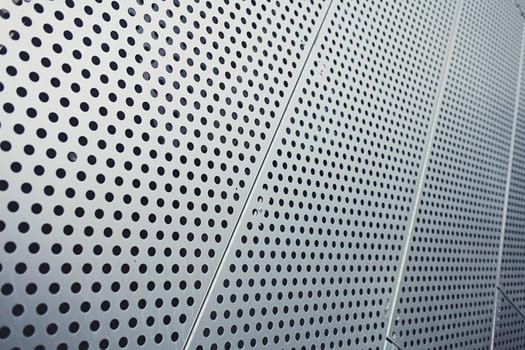 shiny metal panel or texture with circles
