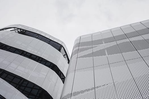 Futuristic modern architecture in Europe. metal forms and facade structures