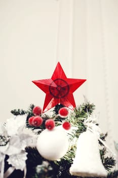 Red star christmas decoration on christmas tree 