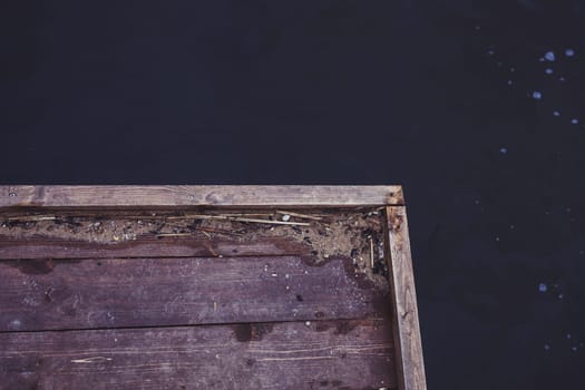 wooden pier by the water, top view