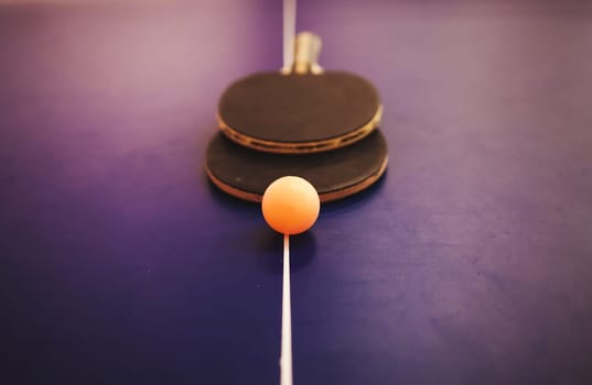 Tennis rackets for pingpong table tennis on blue background