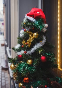 Christmas tree with red hat in Riga