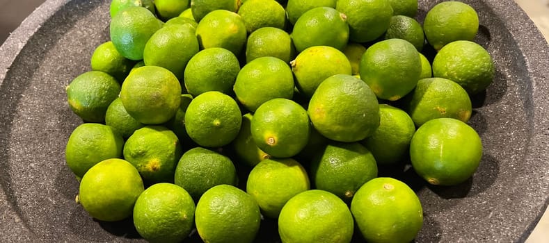 Lime Citrus Fruits In Fruit Market good as your content background