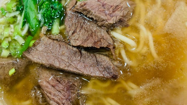 super delicious japanese and korean fusion beef ramen, Bowl of mouth watering Japanese ramen for single serving in a restaurant