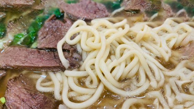 super delicious japanese and korean fusion beef ramen, Bowl of mouth watering Japanese ramen for single serving in a restaurant