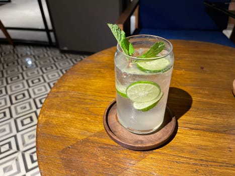 Mojito summer refreshing bar drinks cocktail with ice, lime and mint sweet and fresh