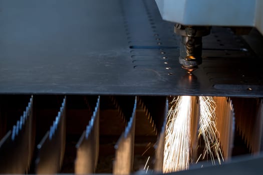 Manufacturing. Laser cutting of sheet metal, close-up