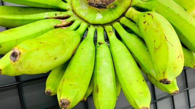 very fresh and ripe delicious banana cluster or banana hand or a bunch of bananas fruit healthy diet supermarket product