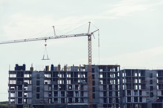 Crane on the construction site of the new house