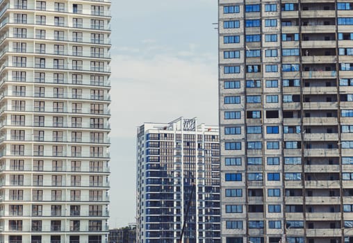 Minsk, Belarus- August 2019: New residential high-rise buildings on the construction site under beautiful summer sky