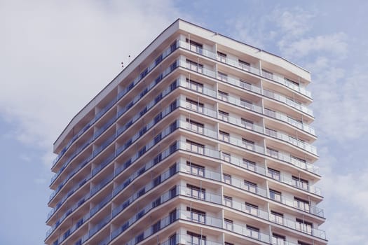 Minsk, Belarus- August 2019: apartment buildings with a blue sky. Facade of a modern apartment building 