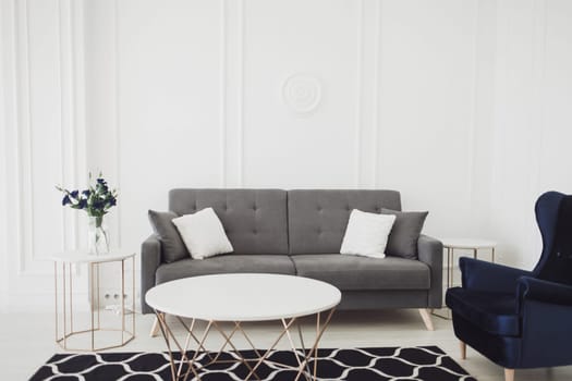 elegant living room with a sofa and a table. modern interior of the hotel