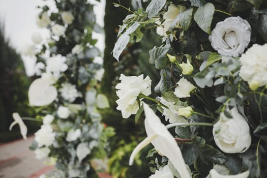 Floral wedding decoration-arch of flowers.