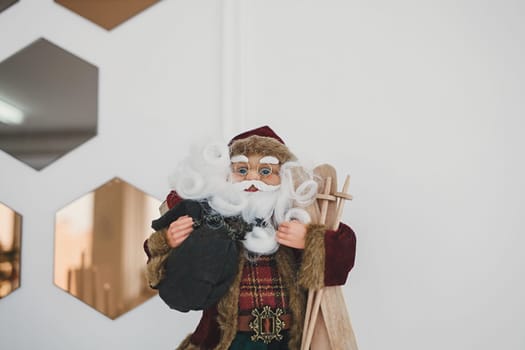 fabric santa claus christmas decoration in room 